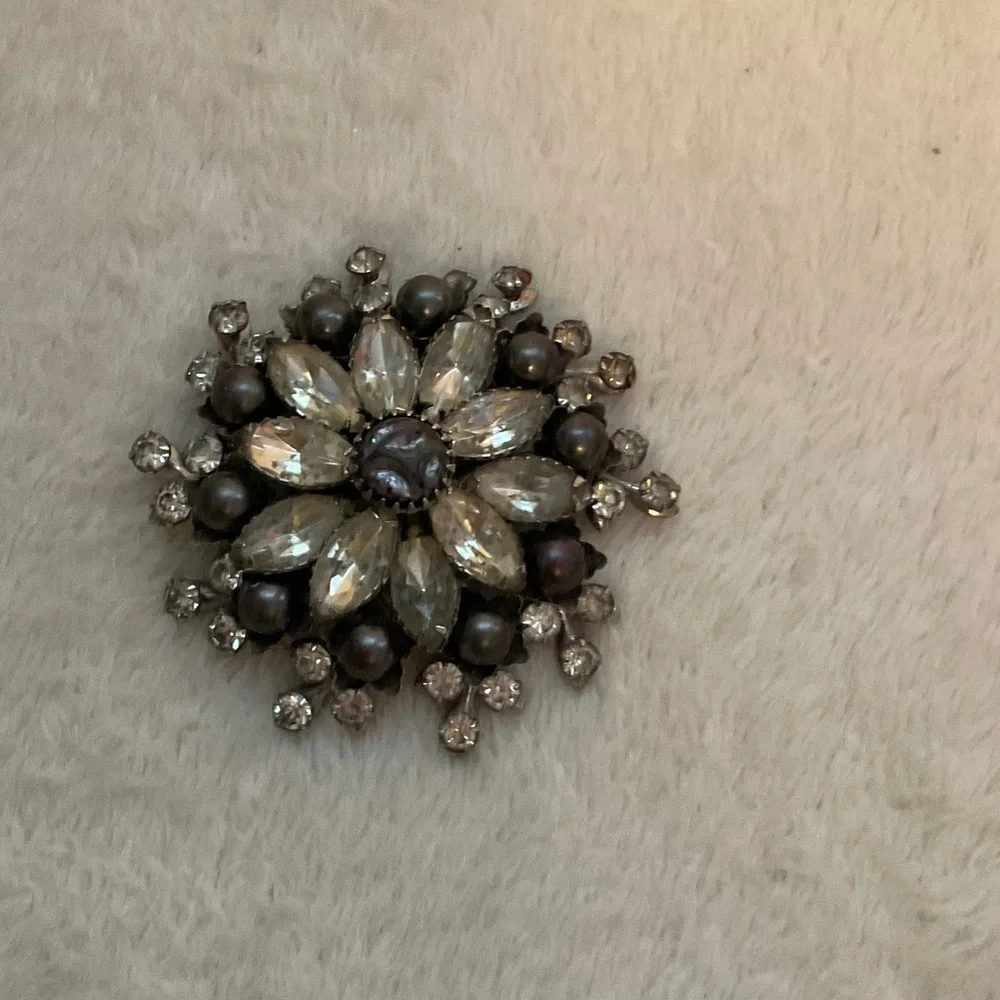 Elegant Silver and Black Brooch